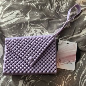 NWT Blush Kiss purple jelly wristlet